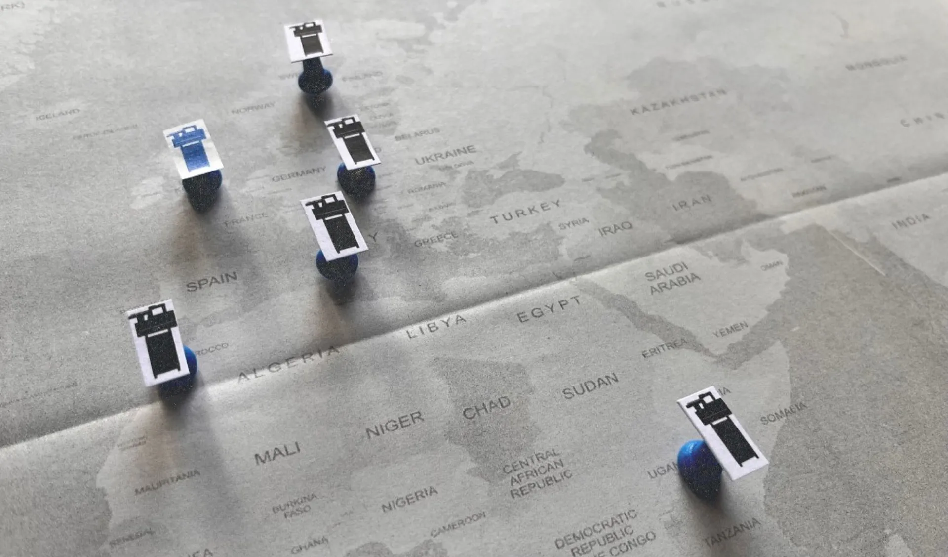PHONOCUT Atelier network locations marked with miniature APC-2 machines on a world map